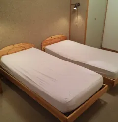 Kamer met eenpersoonsbedden