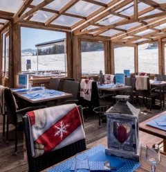 Veranda met uitzicht op de skipistes