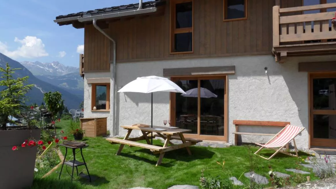 Buitenkant chalet bio corti